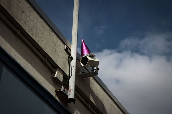 party-hats-on-surveillance-cameras